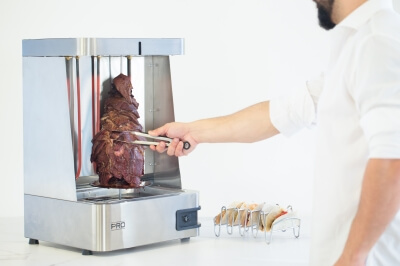 Assador de churrasco grego al pastor